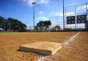 Base,On,Baseball,Field,With,Dirt,And,Foul,Line